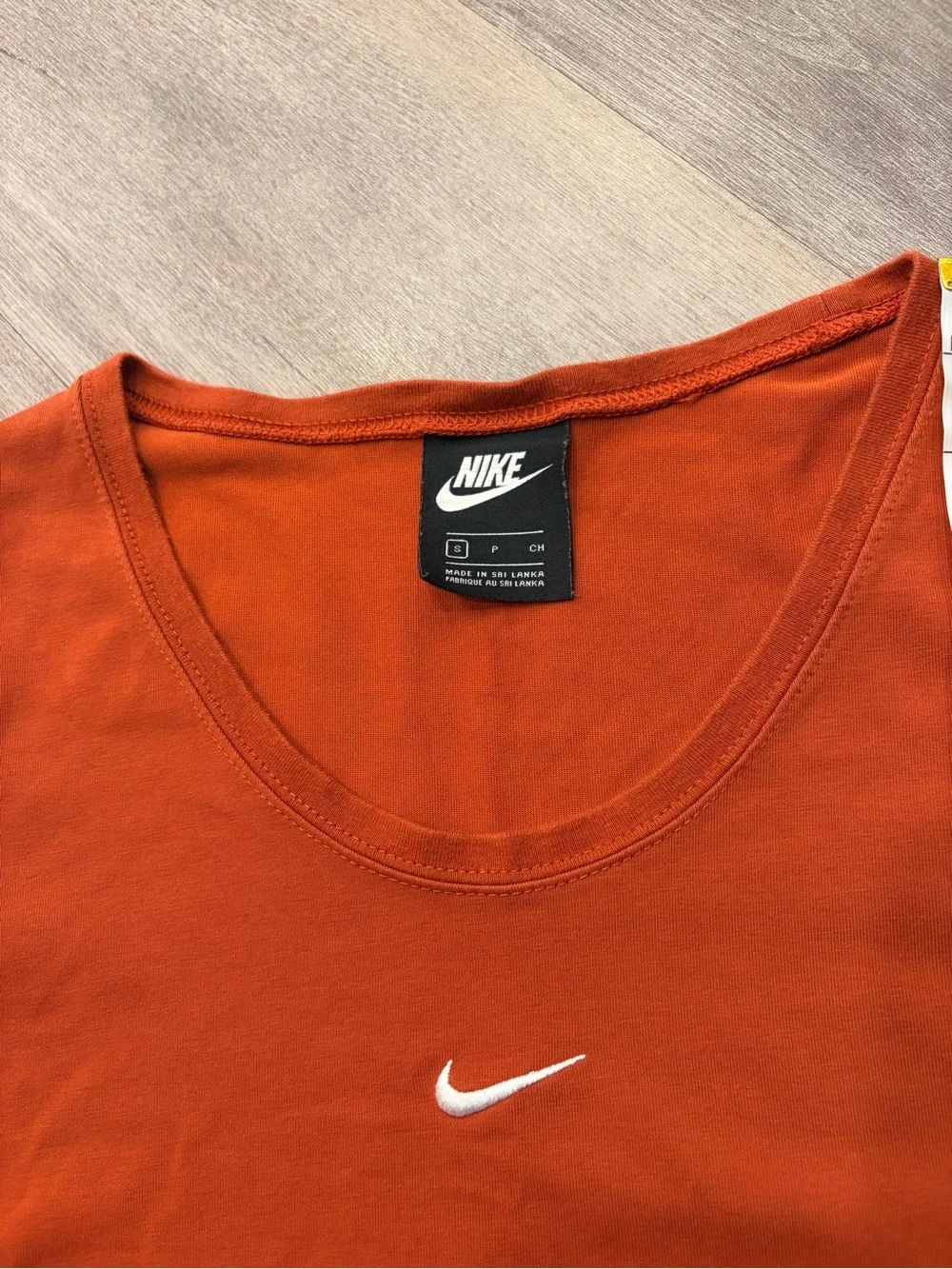 Nike Women's Rust Orange Cropped Tee with White Swoosh
